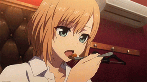 A Girl Is Eating A Spoonful Of Food With Her Tongue Out GIF