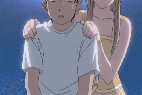 A Girl Is Holding A Boy 'S Shoulders In A Cartoon GIF