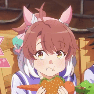 A Girl Is Holding A Carrot And Lettuce In Her Hands GIF