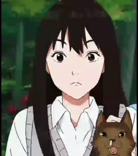 A Girl Is Holding A Cat In Her Arms And Making A Face . GIF