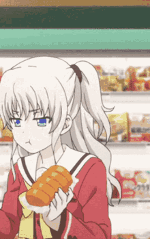 A Girl Is Holding A Loaf Of Bread In Her Hands GIF