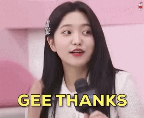 A Girl Is Holding A Microphone And Saying Gee Thanks . GIF