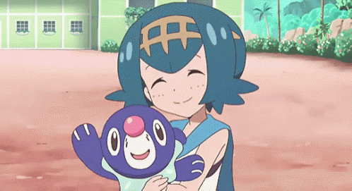 Girl Holding Stuffed Animal And Smiling GIF