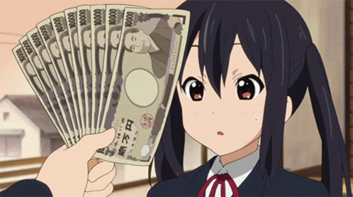 A Girl Is Holding Up A Fan Of Japanese Money GIF