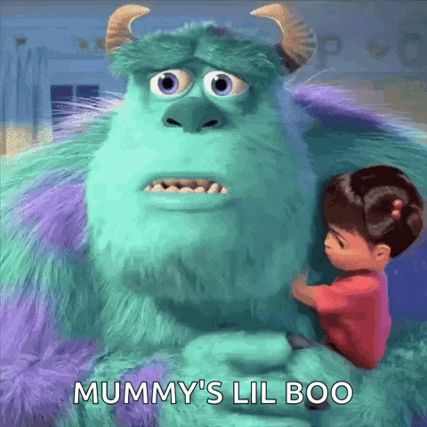 A Girl Is Hugging A Monster From Monsters Inc . GIF