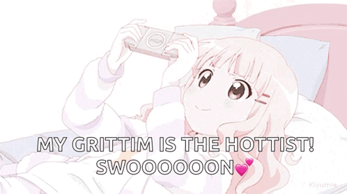 A Girl Is Laying On A Bed Playing A Video Game And The Caption Says My Grittim Is The Hottest Swoooooon GIF