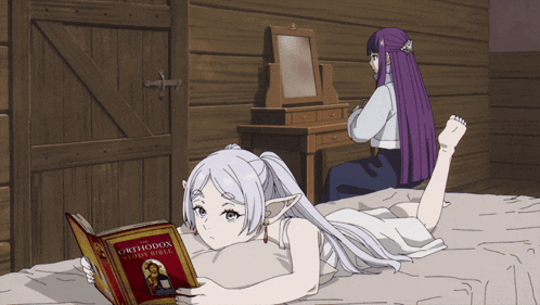 A Girl Is Laying On A Bed Reading A Book Called Orthodox Stories Bible GIF