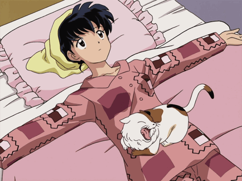 A Girl Is Laying On A Bed With A Cat On Her Shoulder GIF