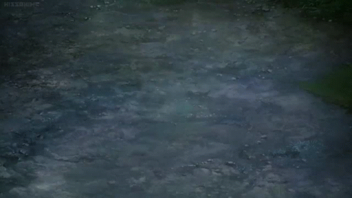 A Girl Is Running In Front Of A Tree With White Flowers GIF