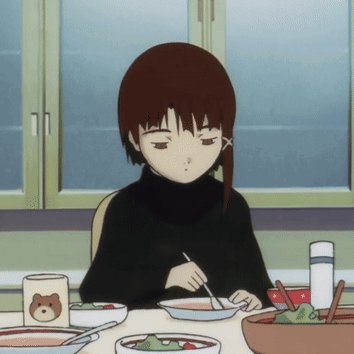 A Girl Is Sitting At A Table With A Bowl Of Soup And A Mug With A Teddy Bear On It GIF