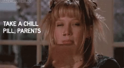A Girl Is Sitting In Front Of A Window With Her Eyes Closed And A Book In Her Hand . GIF