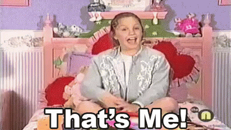 A Girl Is Sitting On A Bed And Saying That 'S Me GIF