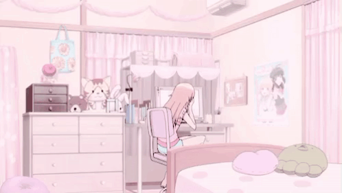 A Girl Is Sitting On A Chair In A Pink Bedroom With A Desk And A Bed . GIF