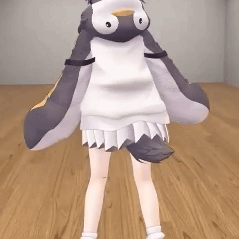 A Girl Is Standing In A Room Wearing A Penguin Costume . GIF