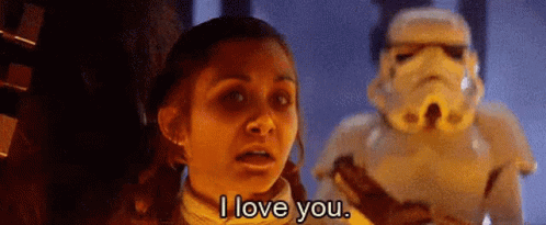 A Girl Is Talking To A Stormtrooper In A Star Wars Movie . GIF