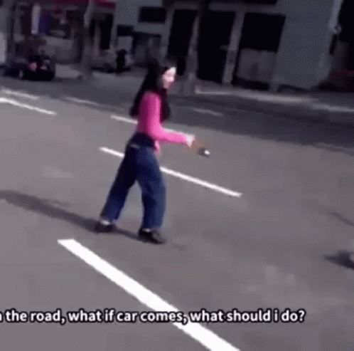 A Girl Is Walking Down A Street Holding A Stick And Asking What Should I Do . GIF