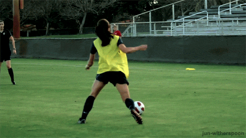 A Girl Kicking A Soccer Ball With Jun-Witherspoon Written On The Bottom GIF
