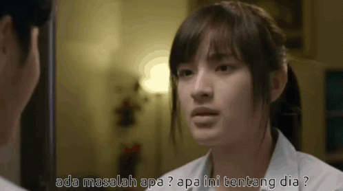 Girl Looking At Mirror With Words About Her GIF