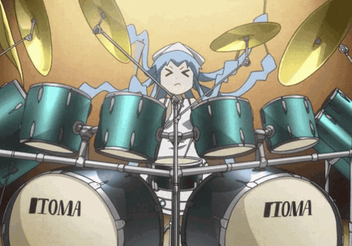 A Girl Playing Drums With A Drum Set Made By Itoma GIF