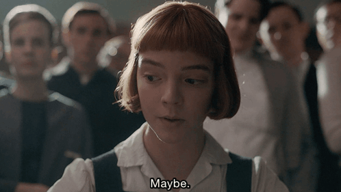 A Girl Says Maybe In Front Of A Crowd Of People GIF