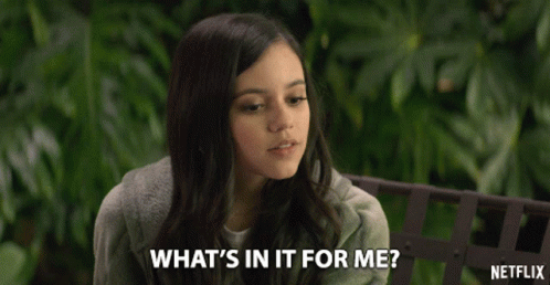 A Girl Sitting On A Bench With A Netflix Logo In The Background GIF