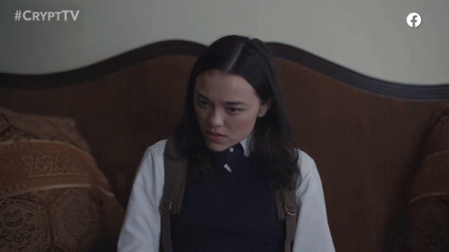 A Girl Sitting On A Couch With The Words I Will Be Kind Above Her GIF