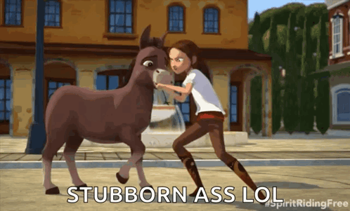 A Girl Standing Next To A Donkey With The Words " Stubborn Ass Lol " Written Below Her GIF