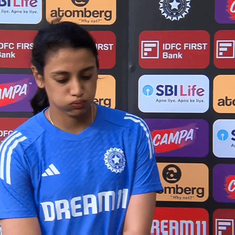 A Girl Wearing A Blue Shirt That Says Dream11 GIF
