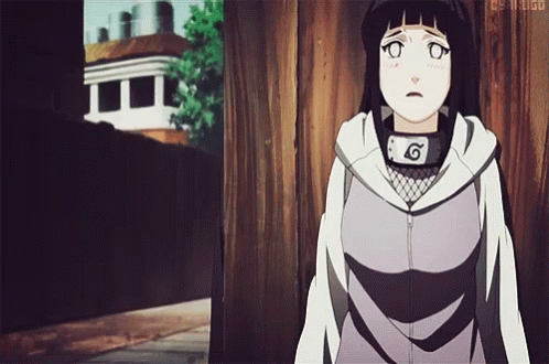 A Girl Wearing A Headband With The Number 6 On It Stands In Front Of A Building GIF