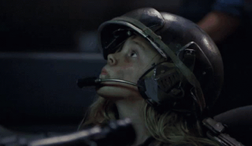 Girl With Helmet And Microphone Looking Up GIF