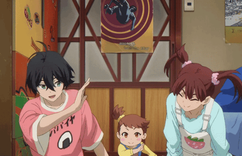 A Girl Wearing A Pink Shirt That Says Onigiri Is Standing Next To A Boy And A Little Girl GIF