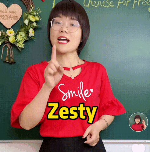 A Girl Wearing A Red Shirt That Says Smile Zesty GIF