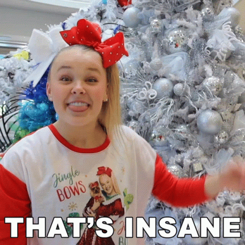 A Girl Wearing A Shirt That Says Jingle Bows On It GIF