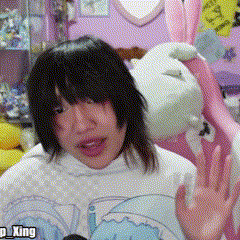 A Girl Wearing A White Shirt With The Word King On The Bottom GIF