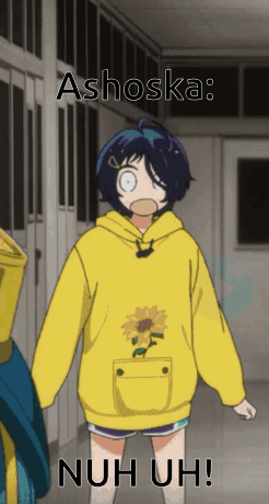 A Girl Wearing A Yellow Hoodie With A Sunflower On The Pocket GIF
