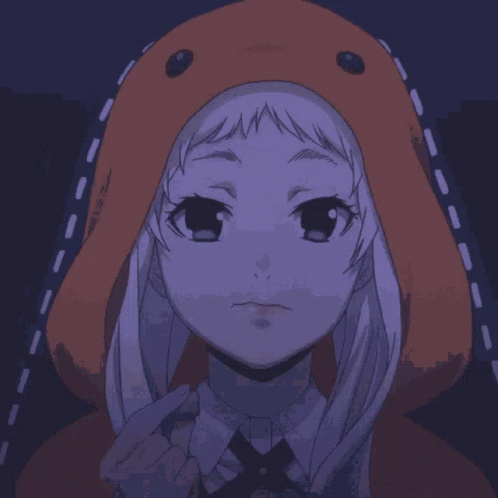A Girl Wearing An Orange Hoodie Is Smiling And Holding A Bowl Of Popcorn GIF