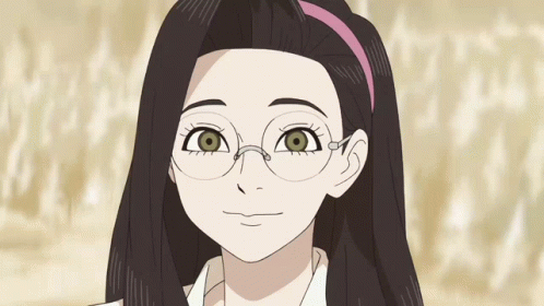 A Girl Wearing Glasses And A Pink Headband Smiles For The Camera GIF