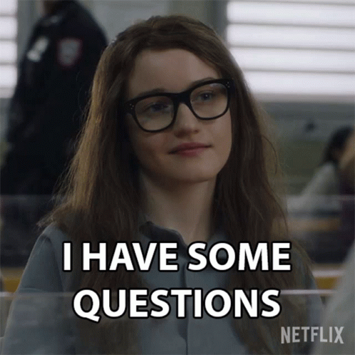 A Girl Wearing Glasses Says I Have Some Questions GIF