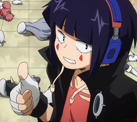 A Girl Wearing Headphones Is Giving A Thumbs Up Sign GIF
