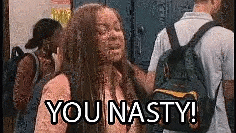 A Girl With A Backpack Is Standing In A Locker Room With A Man Standing Behind Her . GIF