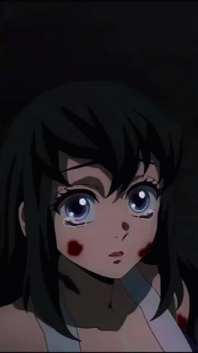 A Girl With A Bandage On Her Arm Is Crying GIF