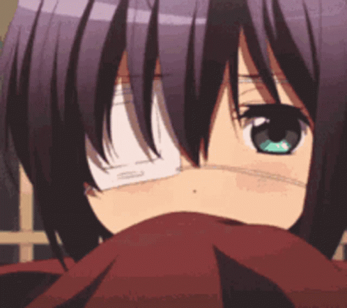 A Girl With A Bandage On Her Eye Covering Her Mouth GIF