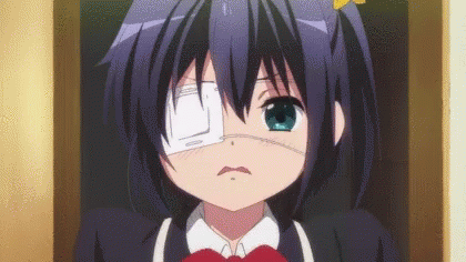 A Girl With A Bandage On Her Eye Is Making A Funny Face . GIF