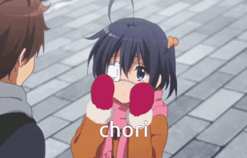 A Girl With A Bandage On Her Eye Is Wearing Red Gloves And The Word Chori Is On The Bottom Right GIF