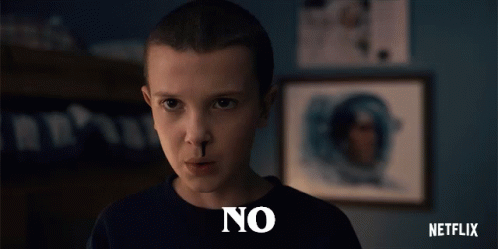 a girl with a black nose has the word no written on her face