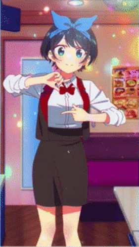 A Girl With A Blue Bow On Her Head Is Pointing GIF