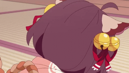 A Girl With A Cat Ear And Bells On Her Ears GIF