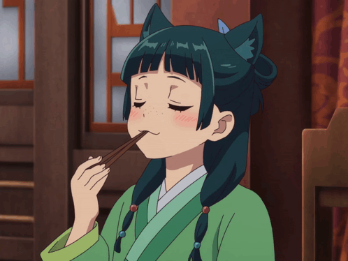 Girl With Cat Ear Eating With Chopsticks GIF