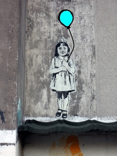 A Girl With A Crown On Her Head Is Holding A Blue Balloon GIF
