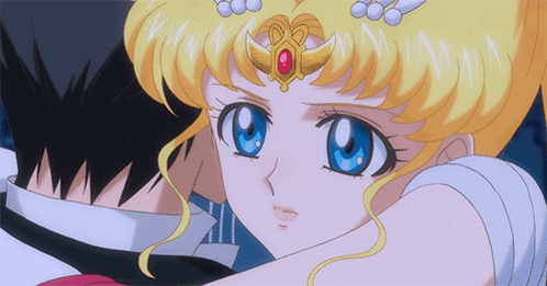 A Girl With A Crown On Her Head Looks At A Man GIF